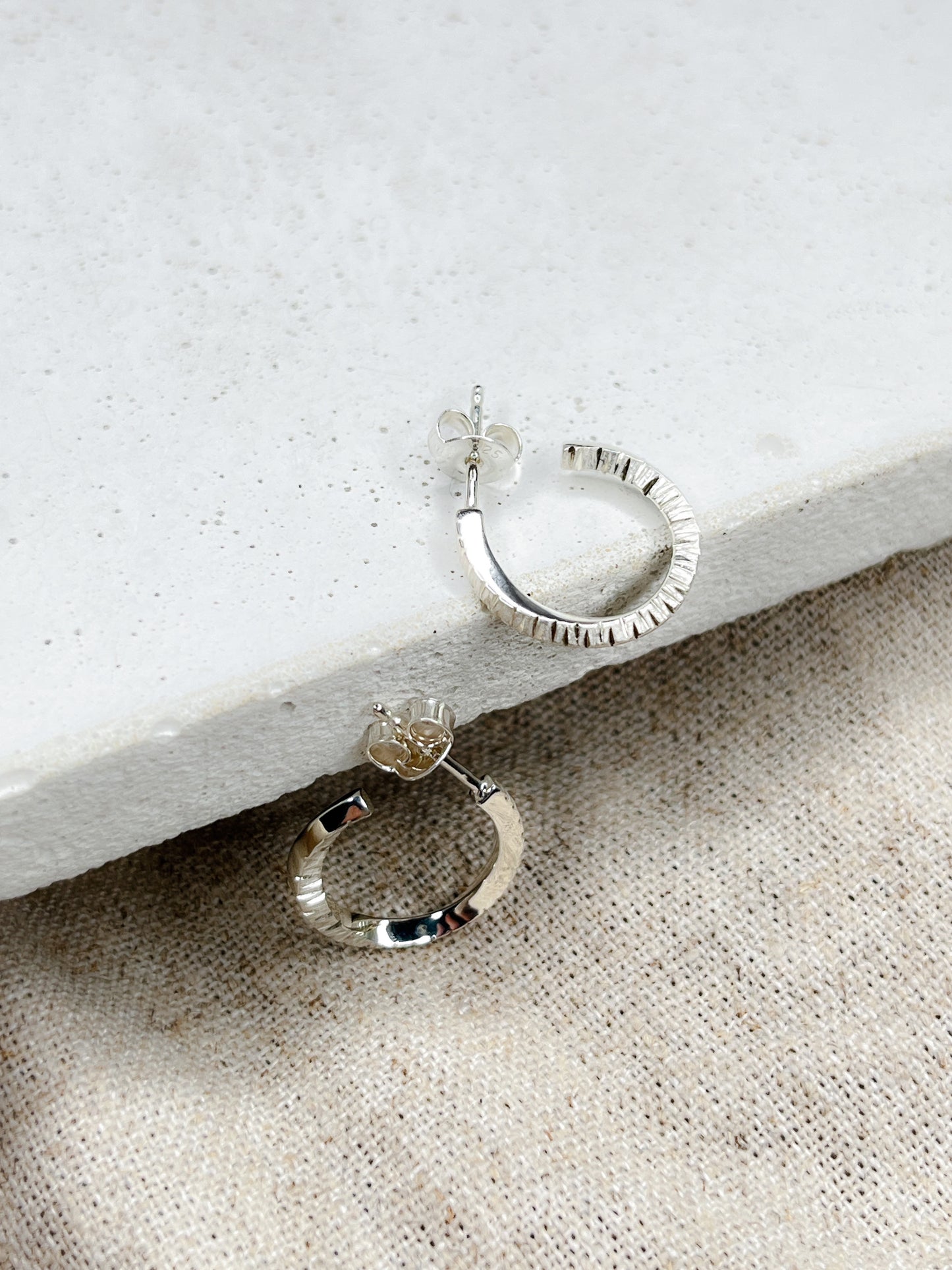 Sterling Silver Textured Twist Flow Hoop Earrings