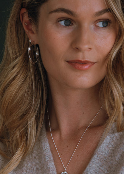 Sterling Silver Organic twist Oval Hoop Earrings - Myleti Jewellery