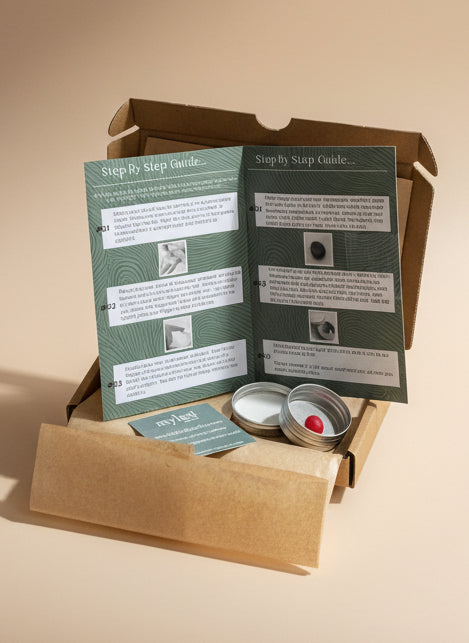 Jewellery Kit with step-by-step guide and small container on a wooden surface