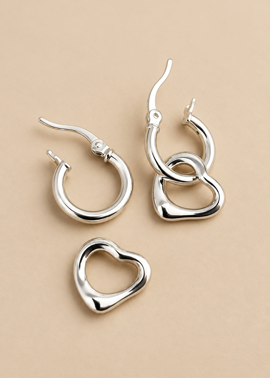 Silver Free Spirit Molten Heart Hoop Earrings