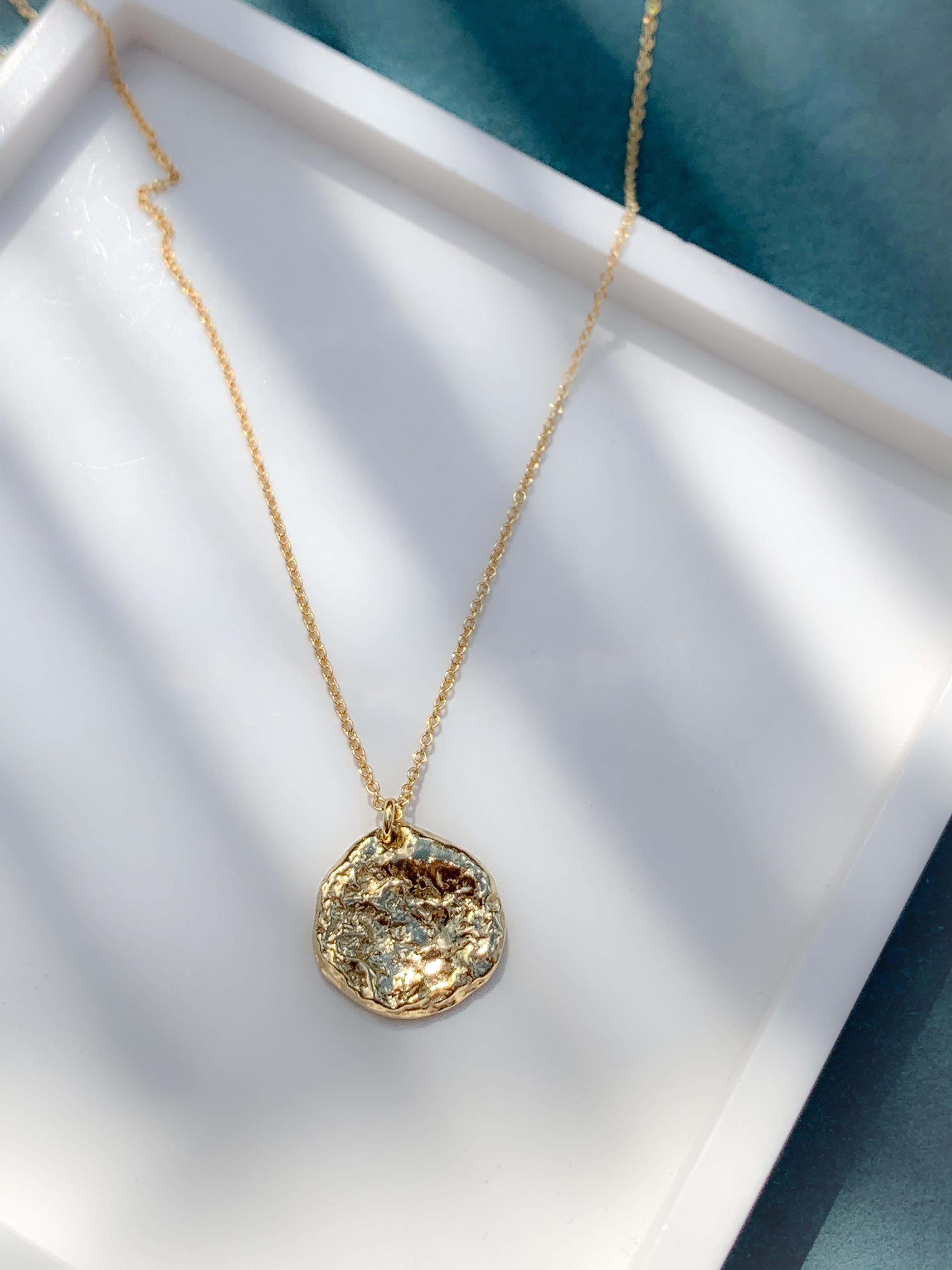 Oval on sale coin necklace